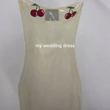 The Invisible Dress Cherry